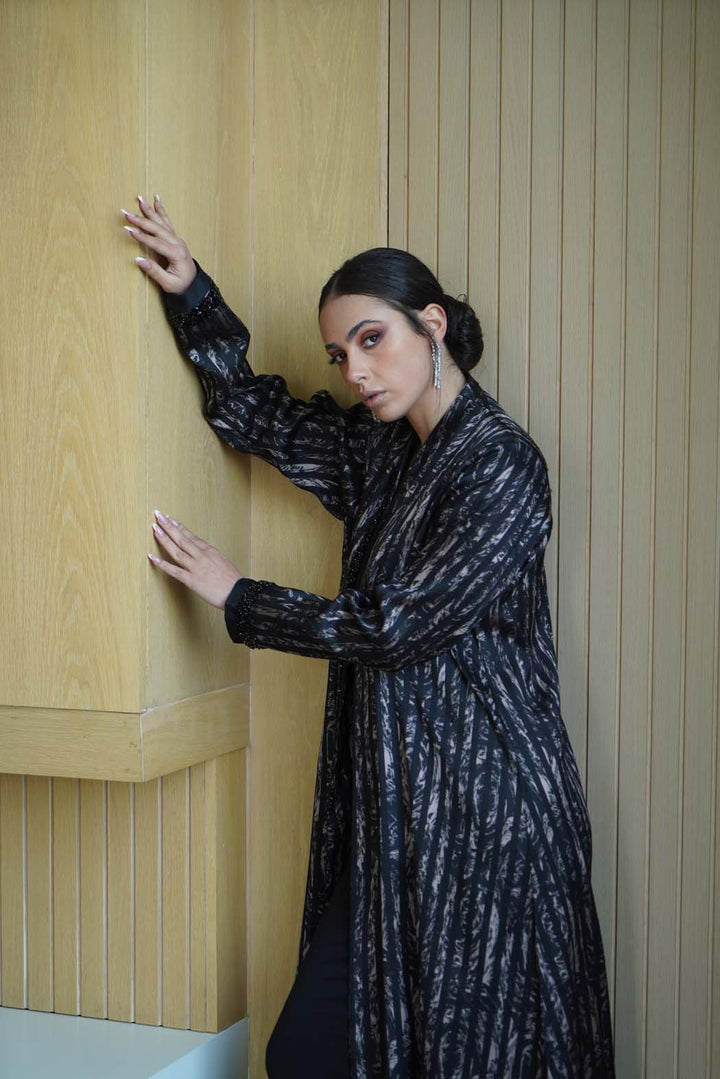 Elegant Abaya with Shimmering Stripes and Black Beaded Details