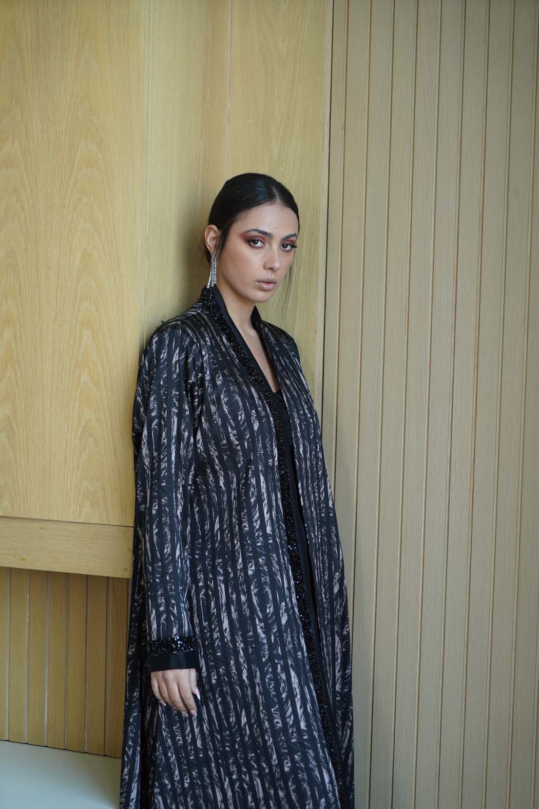 Elegant Abaya with Shimmering Stripes and Black Beaded Details
