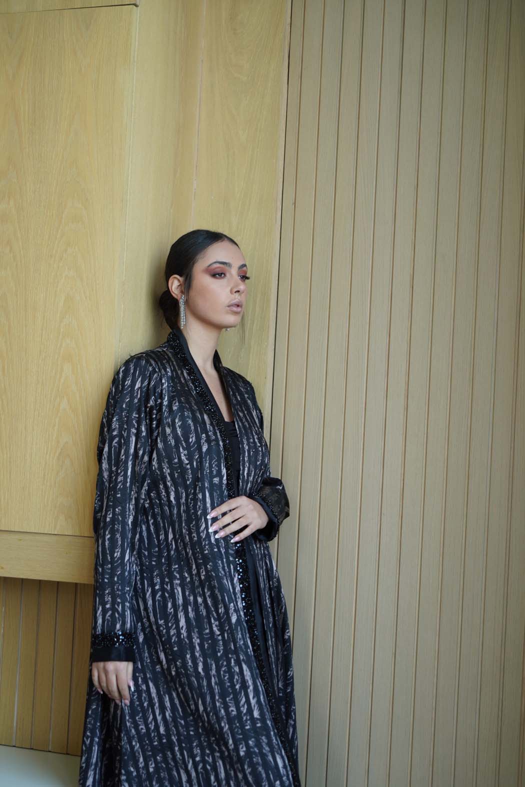 Elegant Abaya with Shimmering Stripes and Black Beaded Details