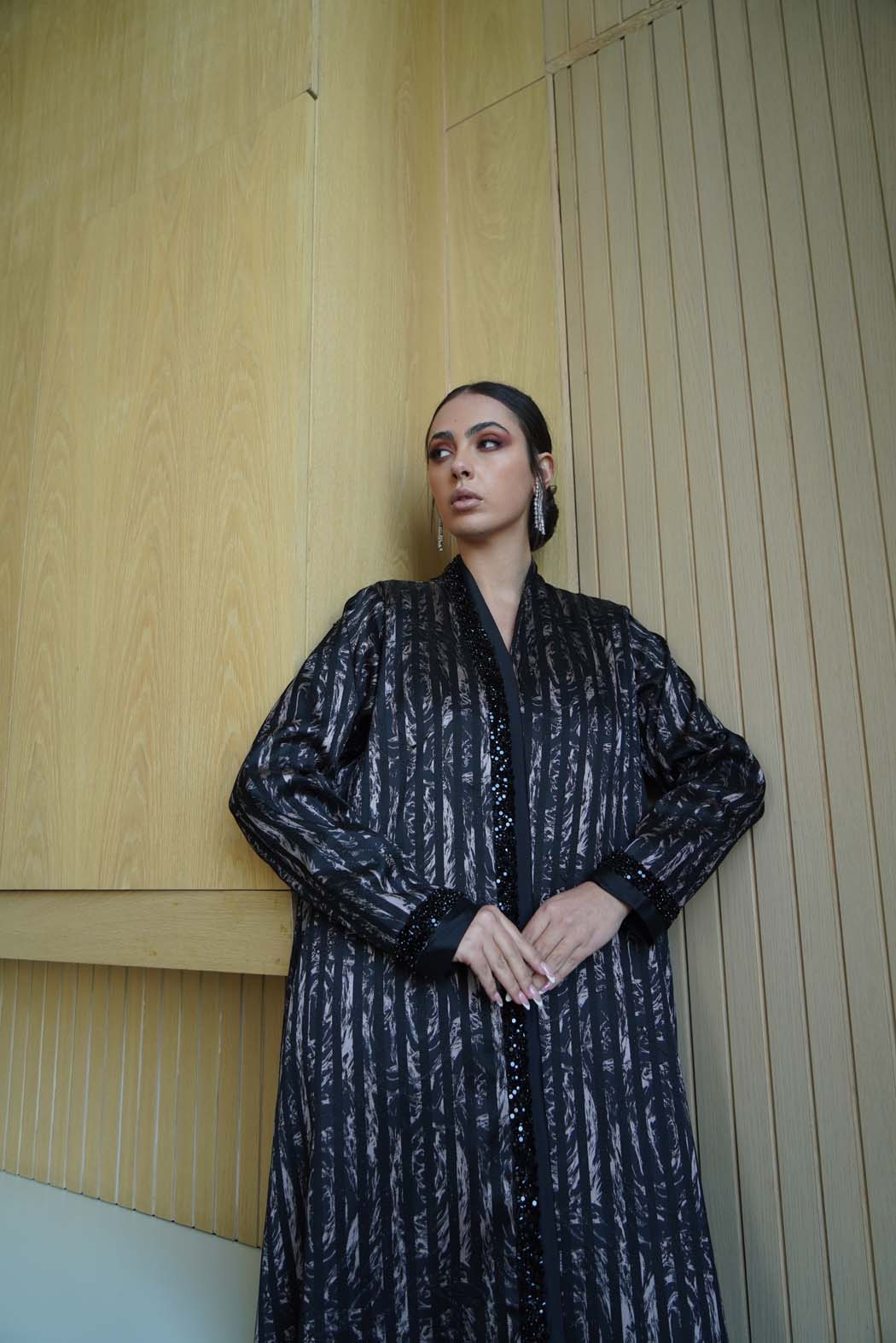 Elegant Abaya with Shimmering Stripes and Black Beaded Details