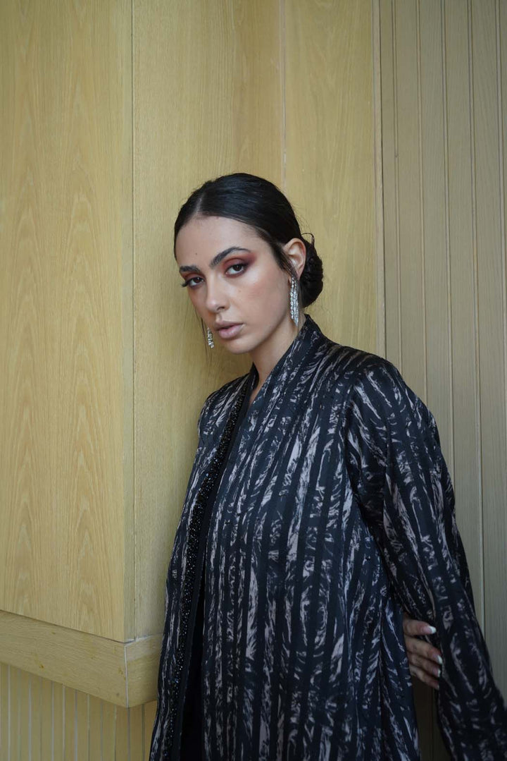 Elegant Abaya with Shimmering Stripes and Black Beaded Details